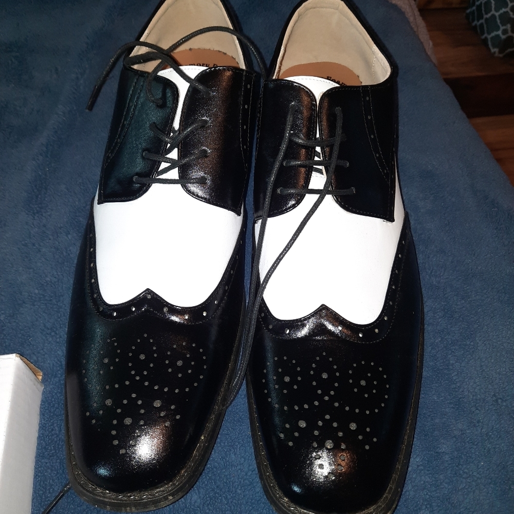 Black & white wingtip shoes